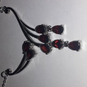 PRICE DROP! Genuine garnet necklace in stainless steel.  Magnetic clasp.